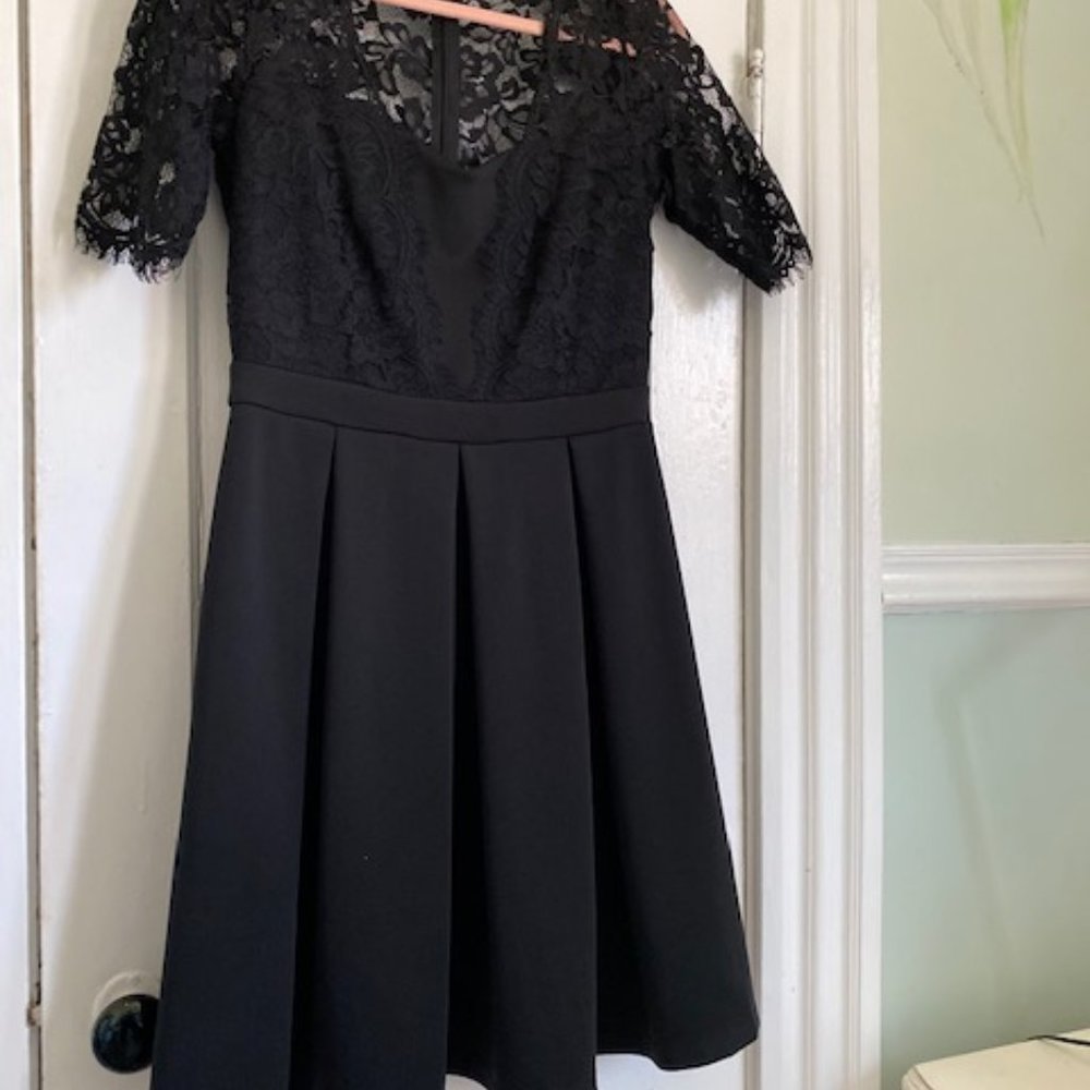 Black fit and flare dress with lace sleeves